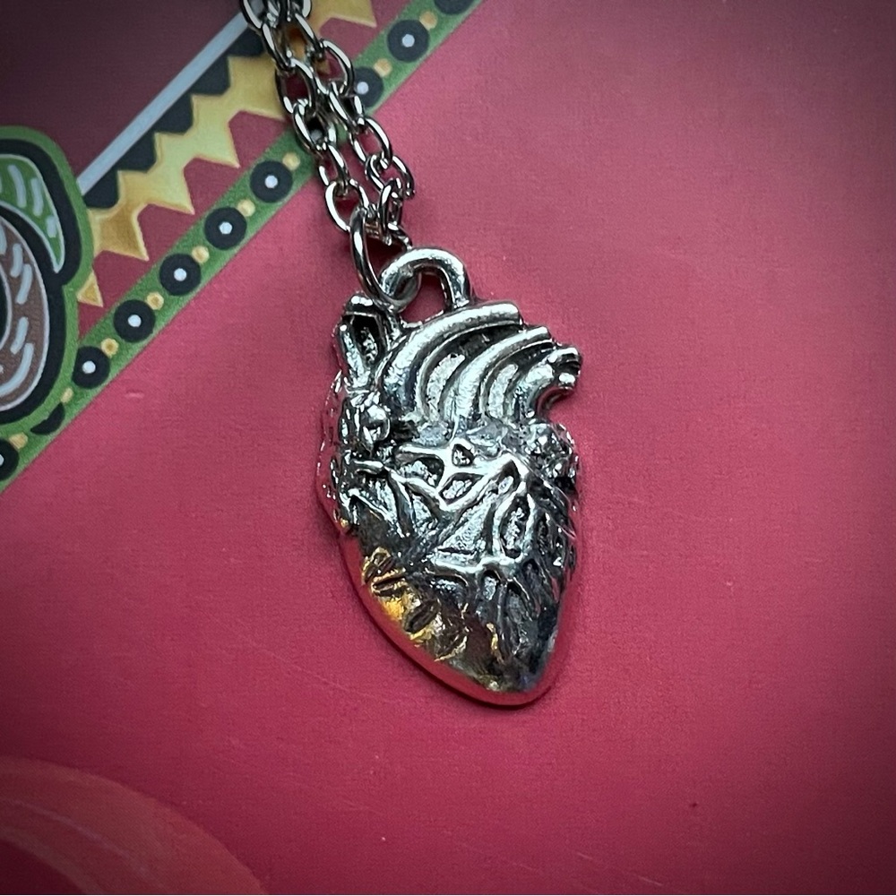 Anatomical heart necklace silver tone with 20 inch chain